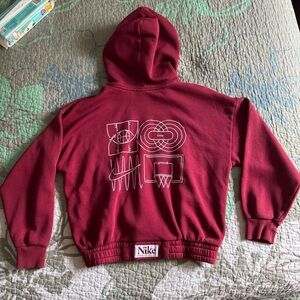 Nike boys maroon pullover hooded sweatshirt size Large 
In great condition